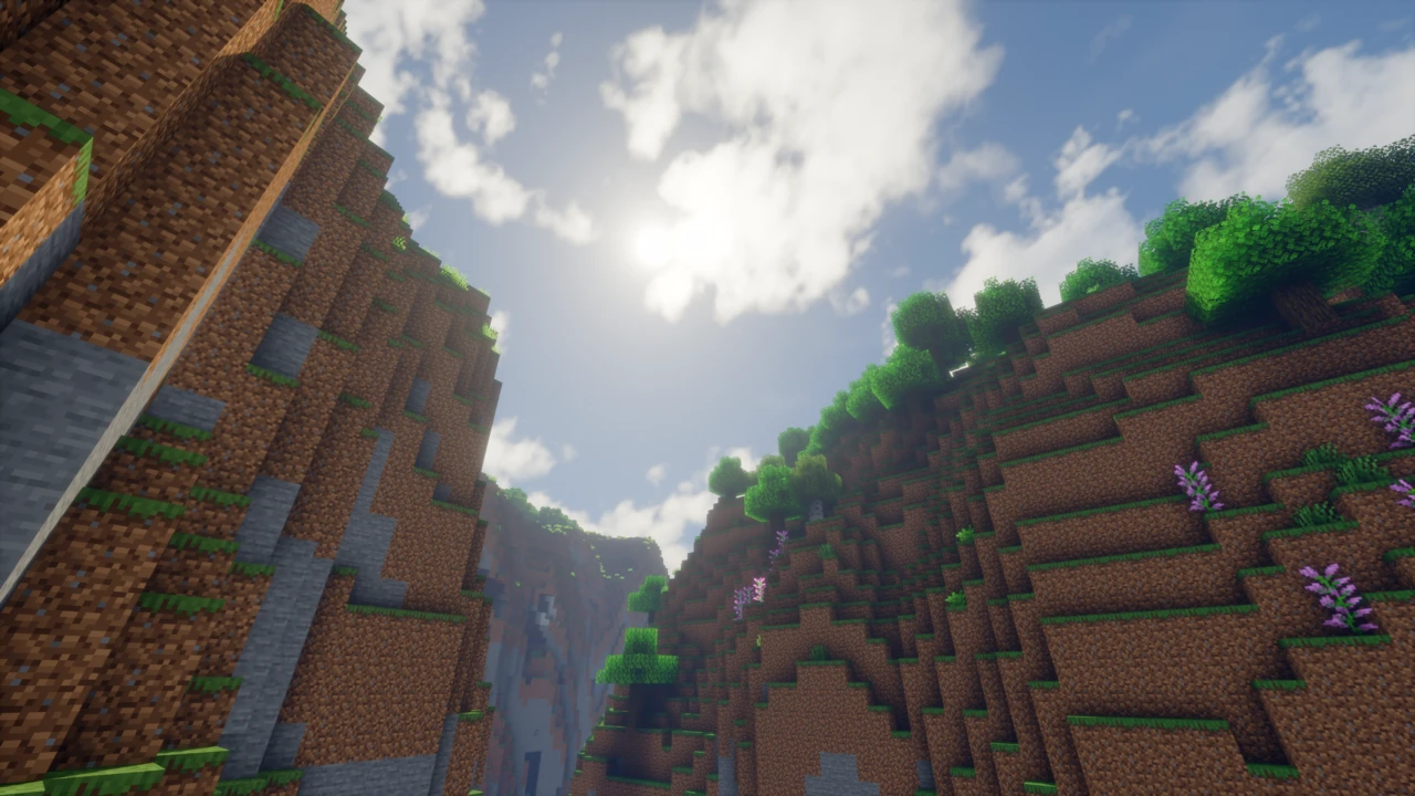 Sunlight over a grassy ravine with Bliss Shaders