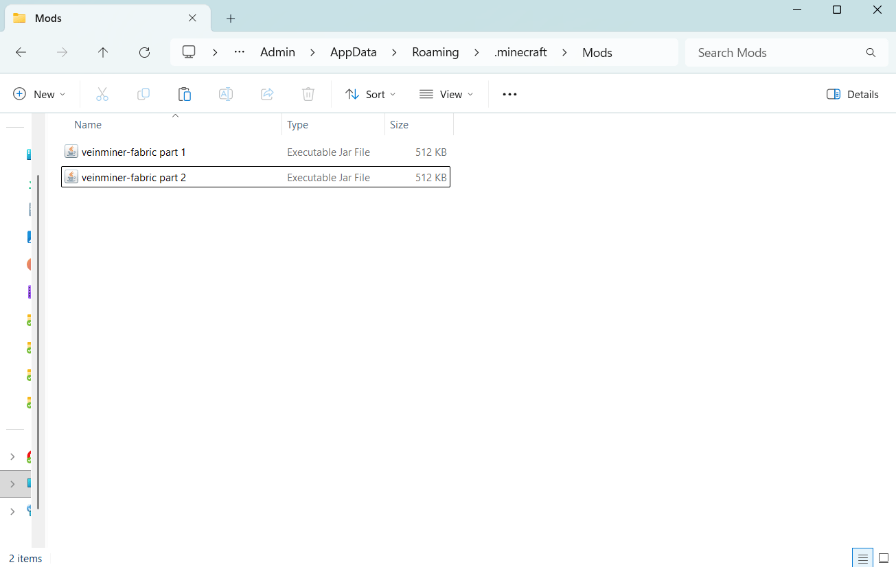 File Explorer showing a Mods folder containing two jar files, named veinminer-fabric part 1 and veinminer-fabric part 2