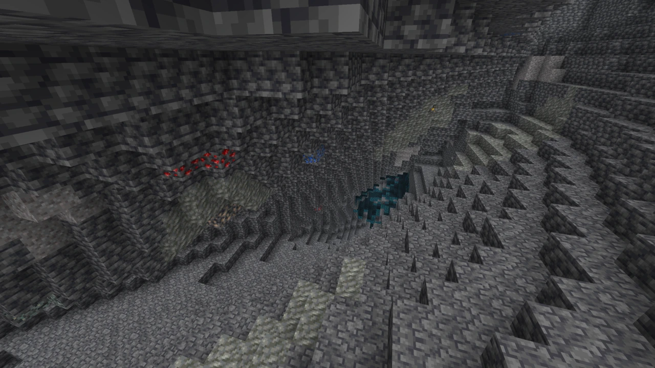 Redstone and diamond ore in a deepslate cave with Night Vision