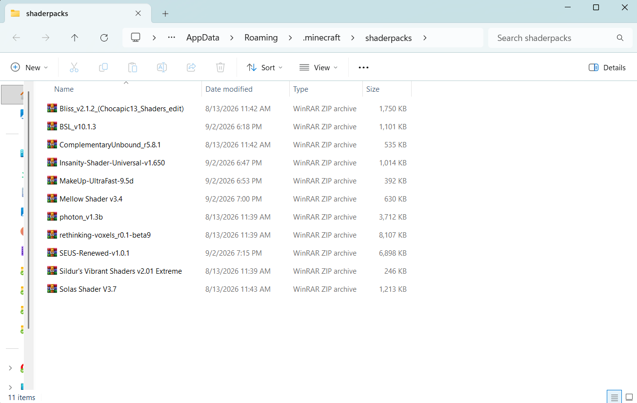 The .minecraft shaderpacks folder in File Explorer, holding eleven shaderpacks each listed as a WinRAR ZIP archive